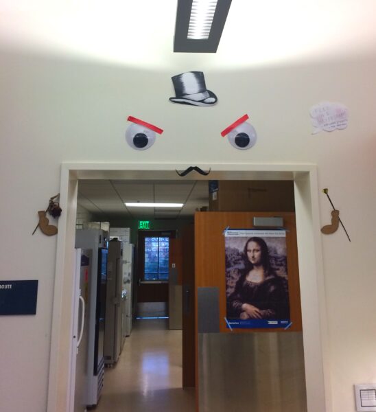 Threshold of the lab as an angry doorway with a top-hat and mustache, hungry for the labor of postdoctoral fellows, undergraduate, and graduate students.