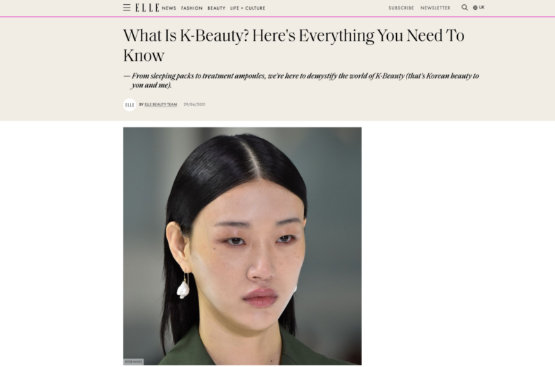 A magazine headline and a photo of a Korean woman.