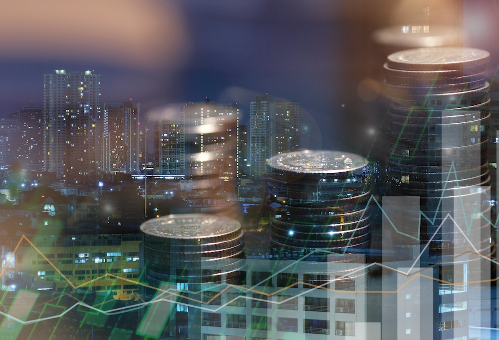 Financial investment concept, Double exposure of city night and stack of coins for finance investor, Forex trading candlestick chart, Cryptocurrency Digital economy. background for invest