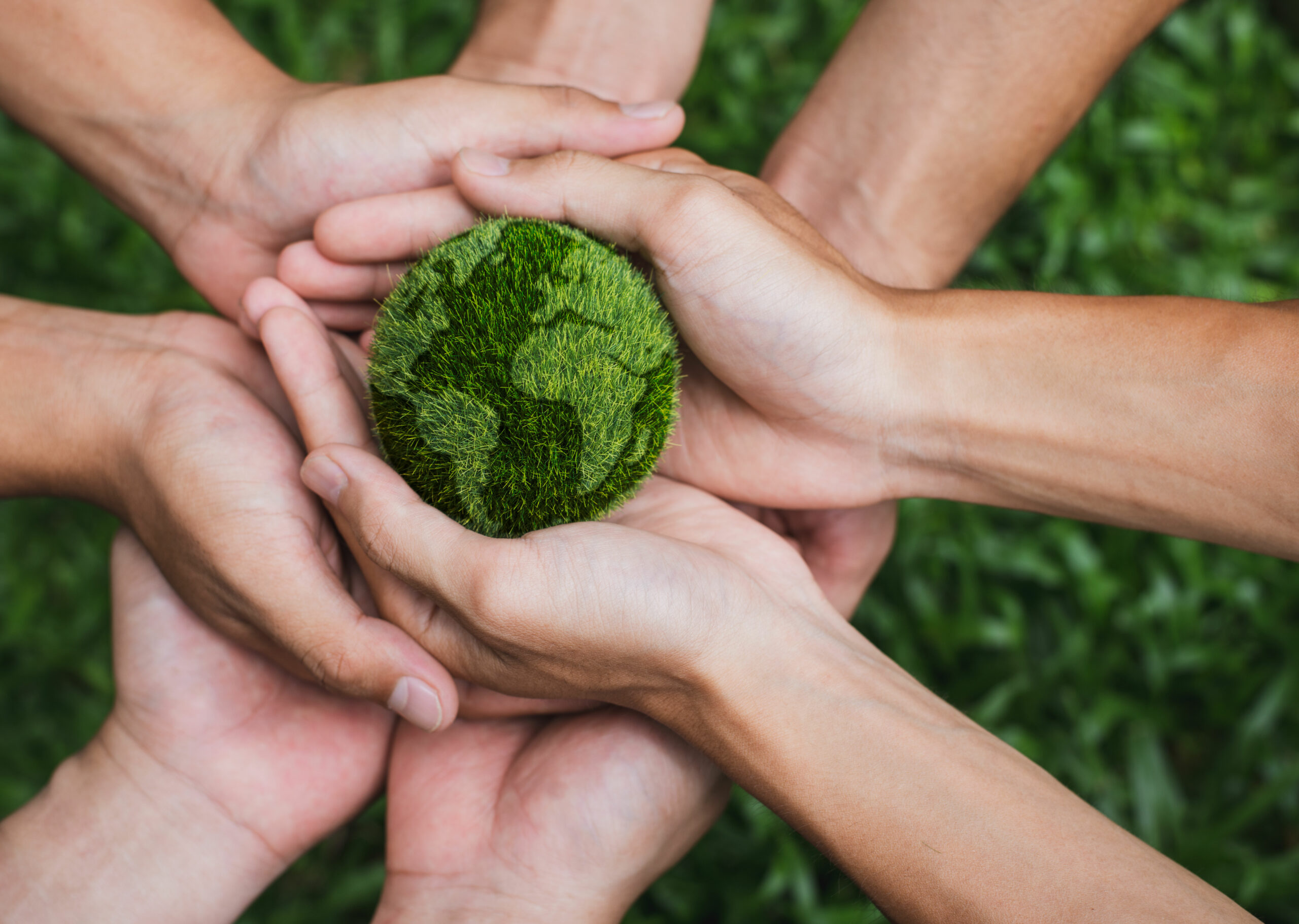 Earth Day. Hands adult Teamwork harmony Holding earth on hands. Environmental and reduce global warming help earth, top view. ecology and environment sustainable concept.