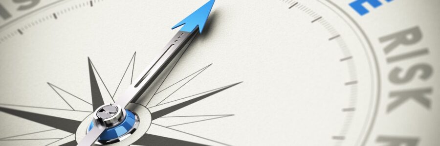 A compass needle pointing to insurance when the other directions are labeled as risk